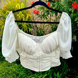 Cropped white corset top